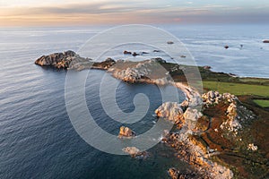 .Drone view of Primel Tregastel, ocean coast in France, Brittany at sunset