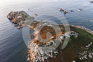 .Drone view of Primel Tregastel, ocean coast in France, Brittany at sunset