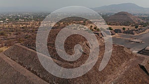 Drone view of Pyramid of Moon peak in Teotihuacan complex in Mexico Valley. Birds eye revealing the Temple of Sun and