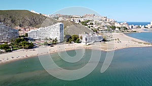 Drone view of the Raco beach of the tourist town of Cullera in the province of Valencia (Spain) with holiday apartments