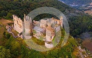 Drone view of remains of Chateau Rocher on cliff, France