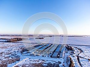 Drone view of a rental storage unit facility with closed bay doors. photo