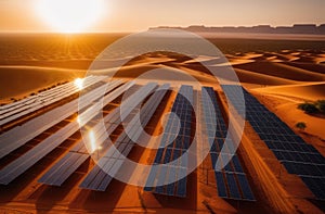 Drone view of solar panels in arid landscape, desert, blue sky, top view. Panorama of modern eco-friendly large solar