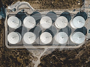 Drone view of storage tank in the forest