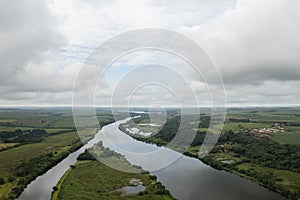 Drone view of Tiete River in cloudy day photo