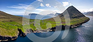 Drone view of Volcano mountain landscape with ocean - Bordoy Vidareidi, Faroe island