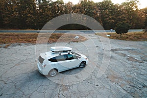 Drone view on white car with autobox