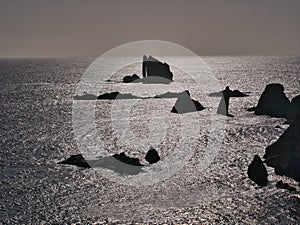 The Drongs and other coastal rocks and stacks off the Ness of Hillswick, Northmavine, in the UNESCO Global Geopark of Shetland, UK