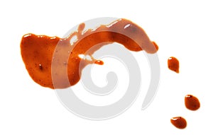 Drop of barbecue sauce on white background