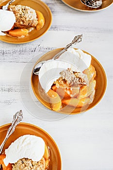 Drop Biscuit Peach Cobbler Shot with Ice Cream From Overhead Position