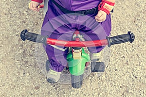 Drop down view of baby bike handle.