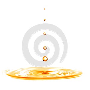 Drop falling into orange water with splash isolated on white