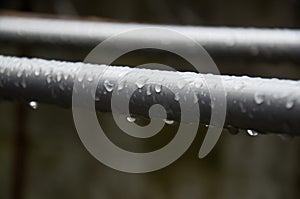 Drop of water on the steel pipe