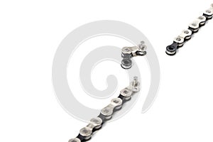 a dropped link of a bicycle chain, the weakest link