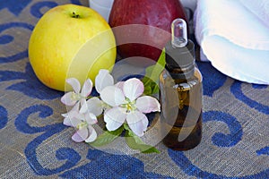 A dropper bottle of apple blossoms extract