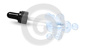 Dropper with serum on white background, top view. Skin care product