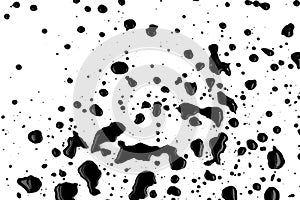 Drops of black paint splattered on a white background, texture