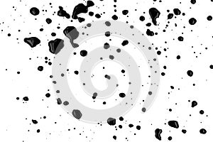 Drops of black paint splattered on a white background, texture