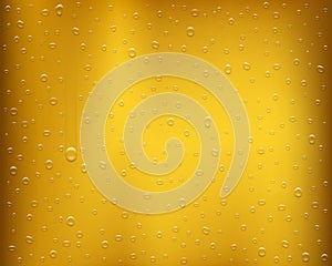 Drops of condensate on a glass with beer or juice
