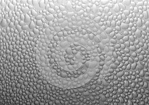 Drops of condensate on the surface of a plastic bottle, close-up