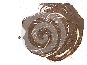 Drops of mud sprayed a white.