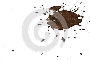 Drops of mud sprayed a white background