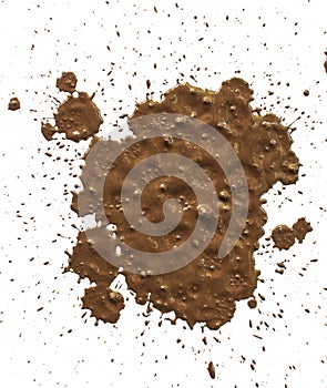 Drops of mud sprayed a white background