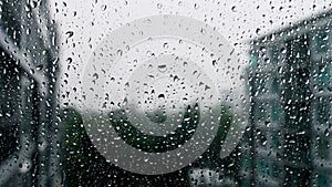 Drops of rain on a window pane, Torrential rain day