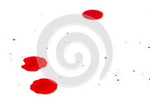 Drops of red blood on white paper