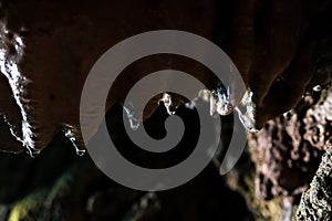 Drops of water inside a cave create stalactites