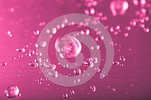 Drops of water in a metal sink on a modern kitchen. Toned