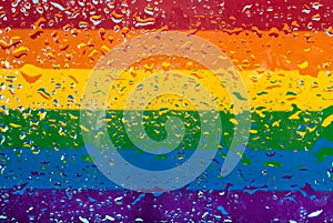 Fluid Spectrum: Water Droplets on LGBT Rainbow Flag