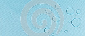 Drops of water on the surface of the fabric. macro