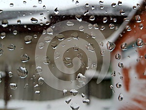 Drops of water on the transparent glass.