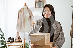 Dropshipping business owner preparing product for customer
