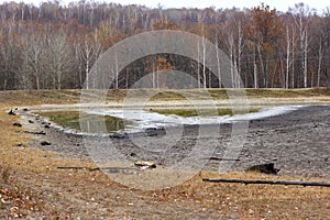 Dry cracked soil, dry lake shore