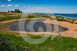 Drought has created very low water level on lake.