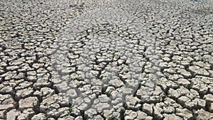 A drought is a period of drier than normal conditions. Dry cracked earth soil.Natural Drought.Cracked soil created texture