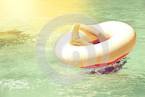 Drowning child, boy falling from lifebuoy