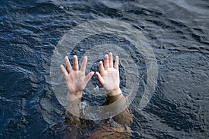 drowning hands reaching