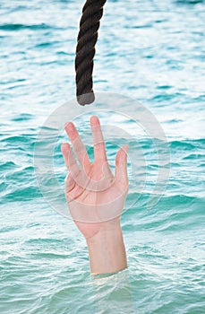 Drowning Man Reaching For Rope