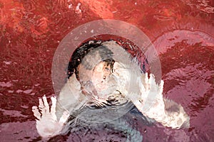 Drowning man in swimming pool  texture Abstract background