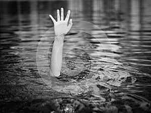 Drowning victims, Hand of drowning man needing help.