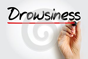 Drowsiness - a feeling of being sleepy and lethargic or sleepiness, text concept for presentations and reports