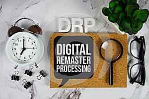 DRP - Digital Remaster Processing acronym with alarm clock and magnifying glass, Data management concept background