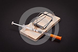 Drug Addict or Heroin Hazard - Insulin Syringe with Drug Dose in Mousetrap