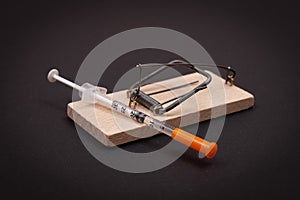 Drug Addict or Heroin Hazard - Insulin Syringe with Drug Dose in Mousetrap