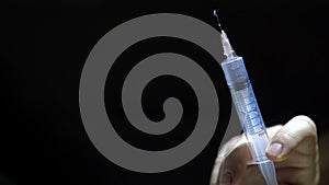 Drug addict a syringe. injection, medications, nCopy Space.