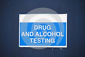 Drug and alcohol testing sign at work for staff