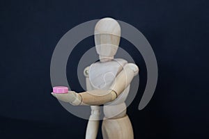 drug pill dealing taking series with wooden manikin figures